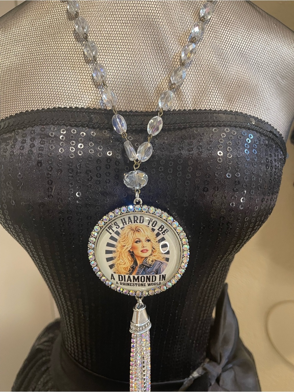 Dolly Iridescent Crystal Medallion Tassel Necklace It’s Hard to be a Diamond.